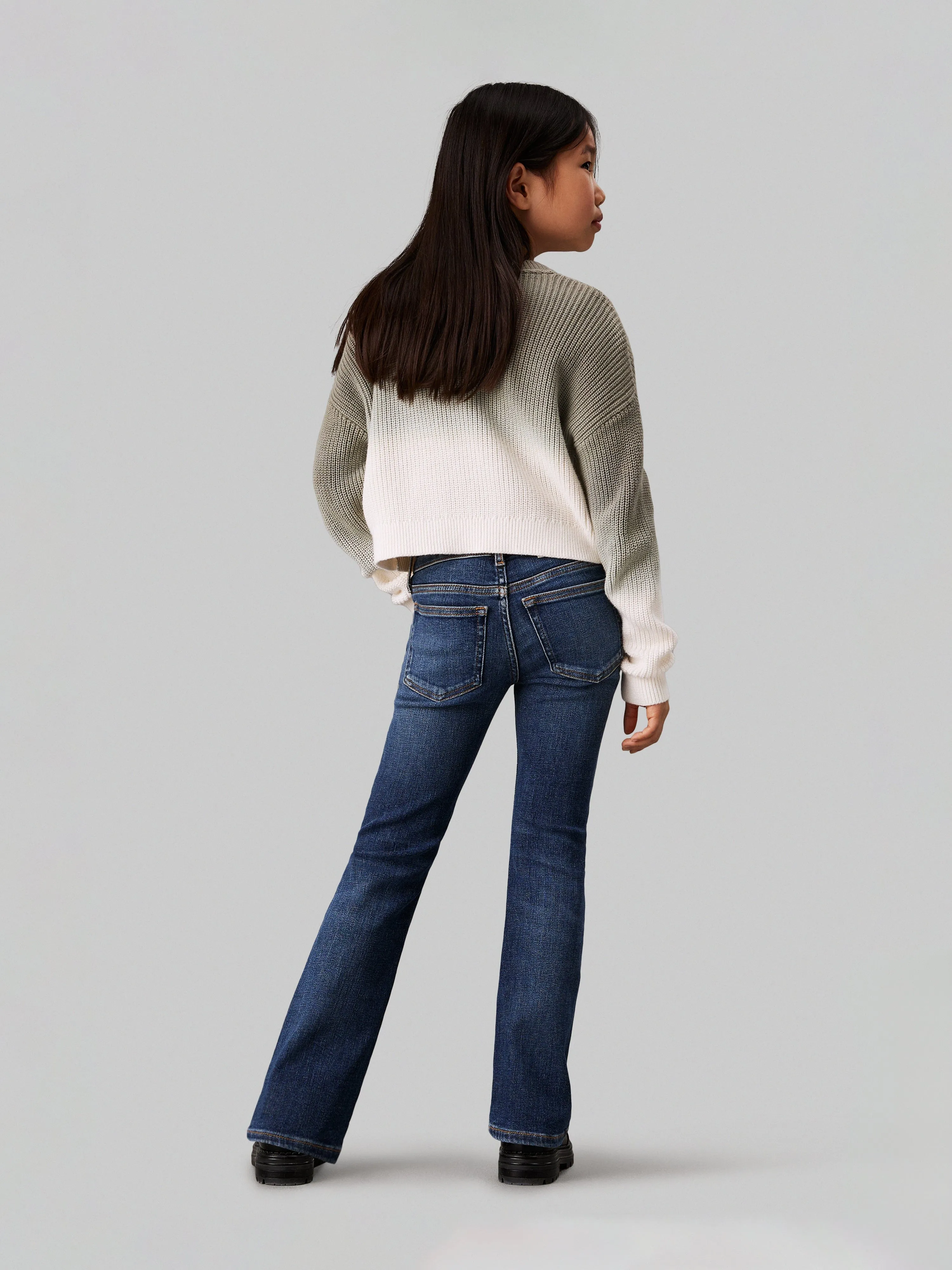 Calvin Klein Girls Mid Rise Flared Jeans in Blue