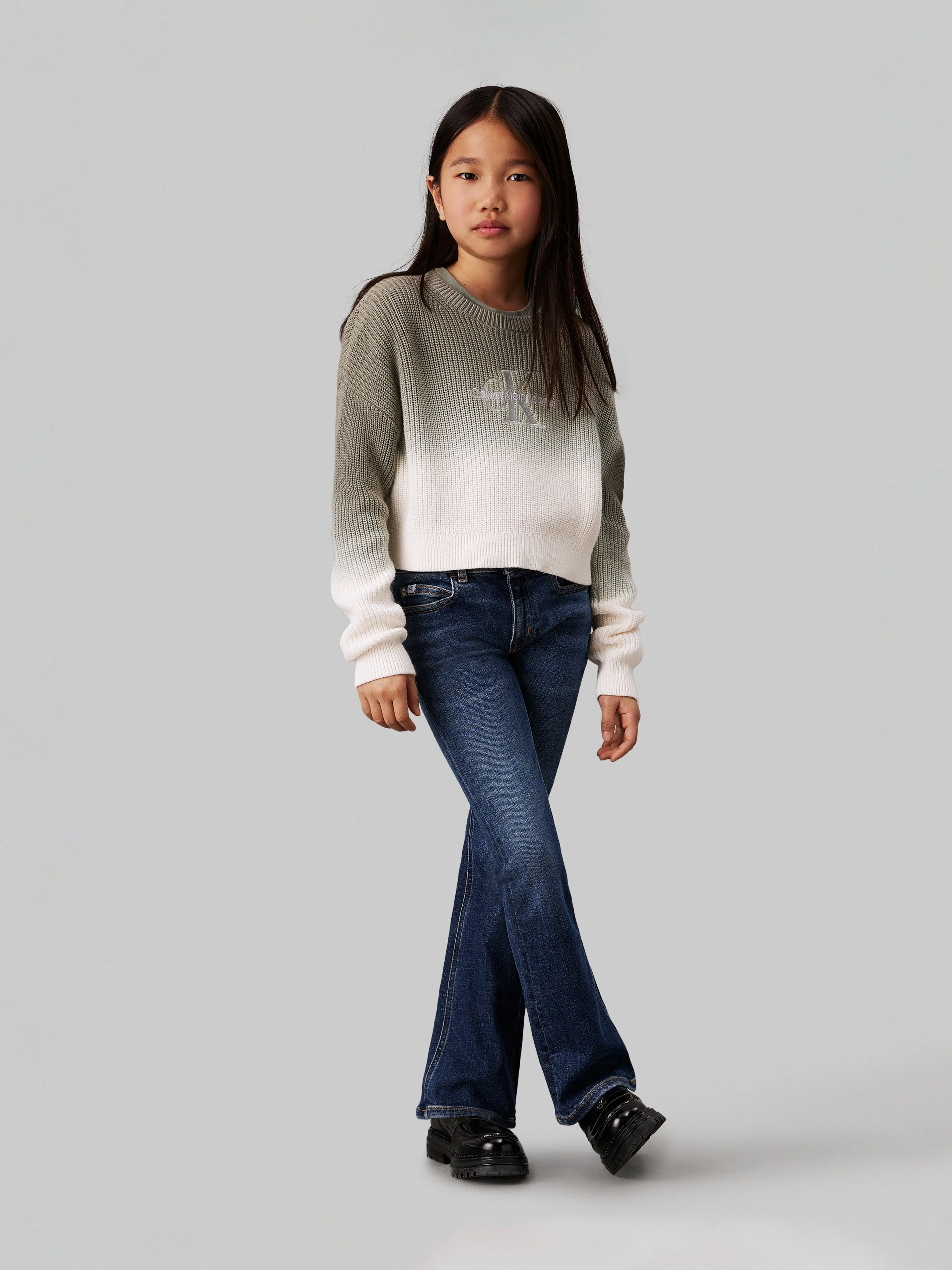 Calvin Klein Girls Mid Rise Flared Jeans in Blue